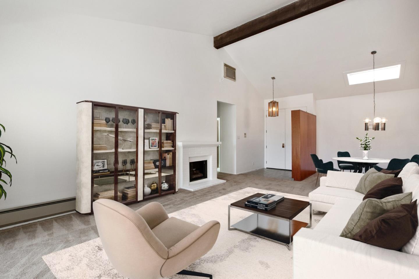 500 Almer Road, Unit 301 Burlingame, CA 94010 - Photo 4 of 24 a living room with furniture and a fireplace