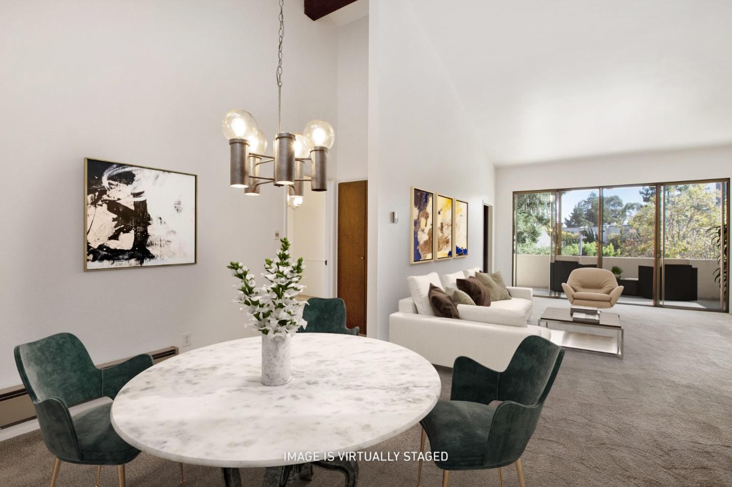 500 Almer Road, Unit 301 Burlingame, CA 94010 - Photo 7 of 24 a living room with furniture and a chandelier