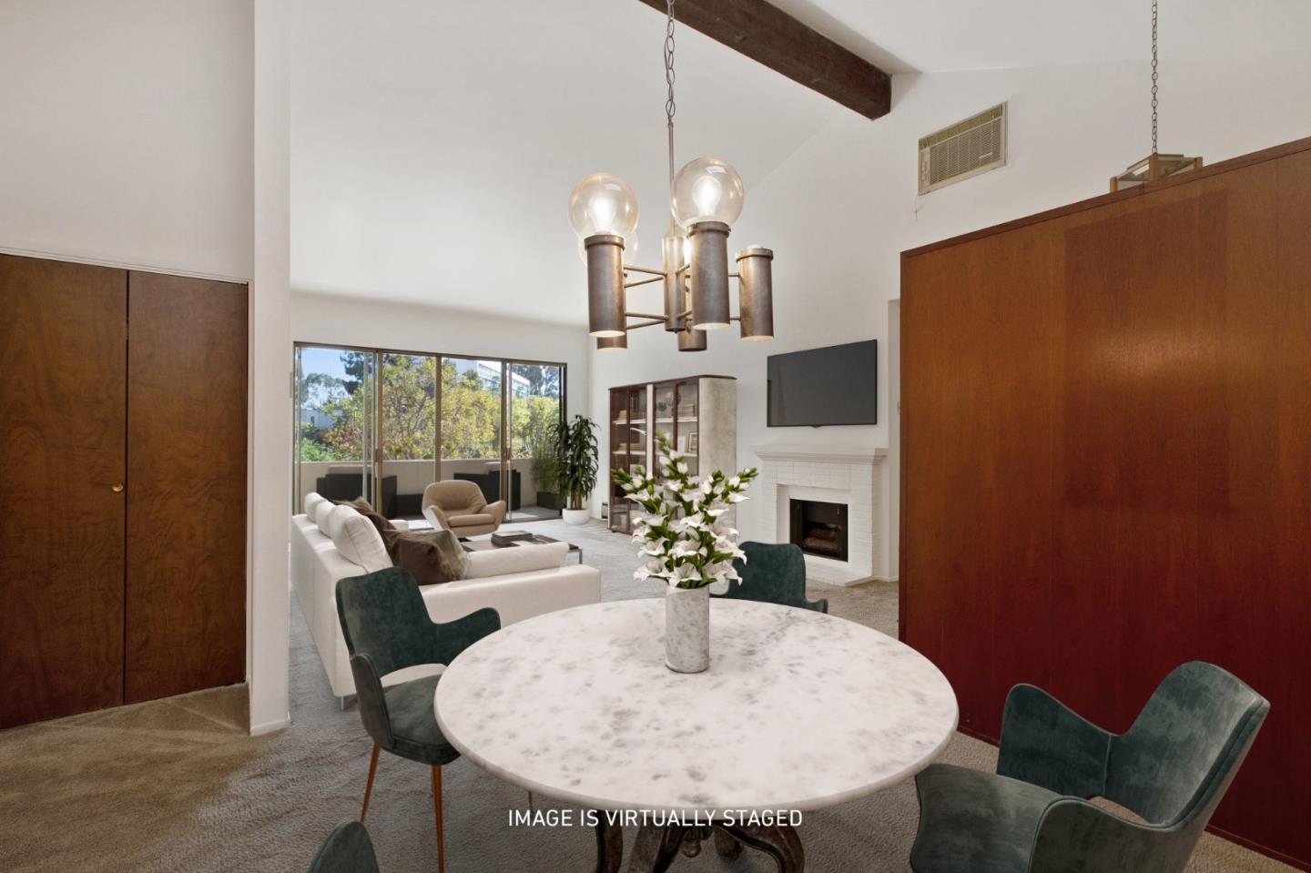 500 Almer Road, Unit 301 Burlingame, CA 94010 - Photo 8 of 24 a view of a dining room with furniture window and outside view