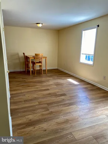 a view of a livingroom with furniture and windows