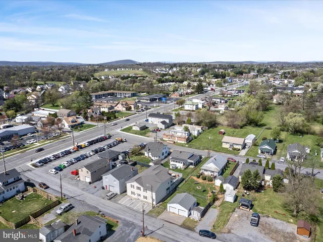 a aerial view of a house with swimming pool