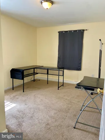 a kitchen with stainless steel appliances granite countertop a refrigerator a stove top oven a sink and dishwasher