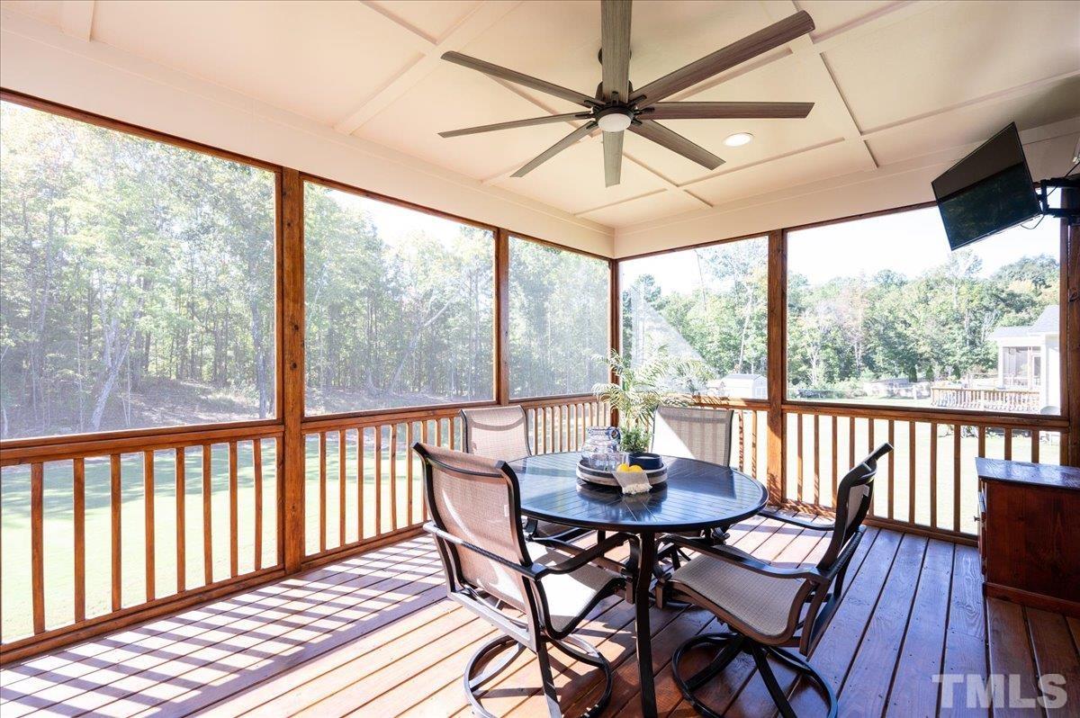 7108 Rex Road Holly Springs, NC 27540 - Photo 10 of 38 What a great space to relax, enjoy time with family and friends, or, if working from home, why not take the "office" outside?