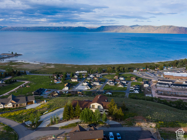 588 Raspberry Patch Road Garden City, UT 84028 - Photo 8 of 74 View of property location with nearby suburban area and a water and mountain view