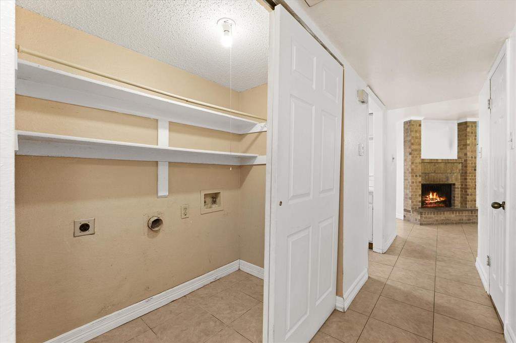 16301 Ledgemont Lane, Unit 109 Addison, TX 75001 - Photo 16 of 32 a view of a hallway with closet