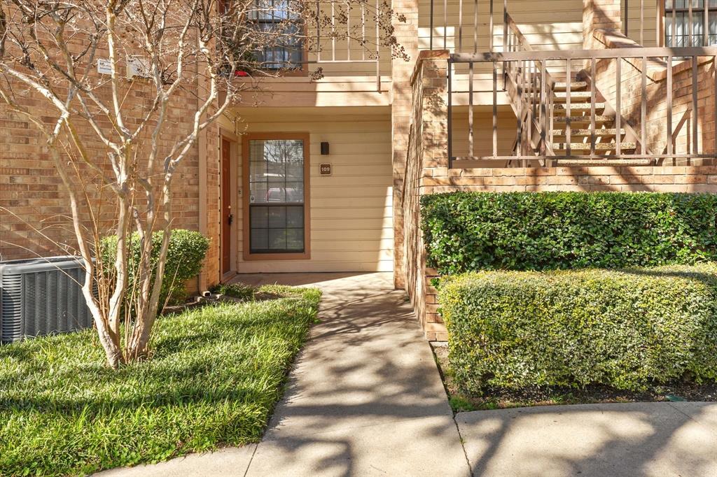 16301 Ledgemont Lane, Unit 109 Addison, TX 75001 - Photo 2 of 32 a front view of a house