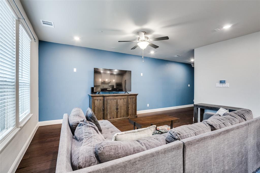 5622 Niagara Road The Colony, TX 75056 - Photo 6 of 28 a living room with furniture and a flat screen tv