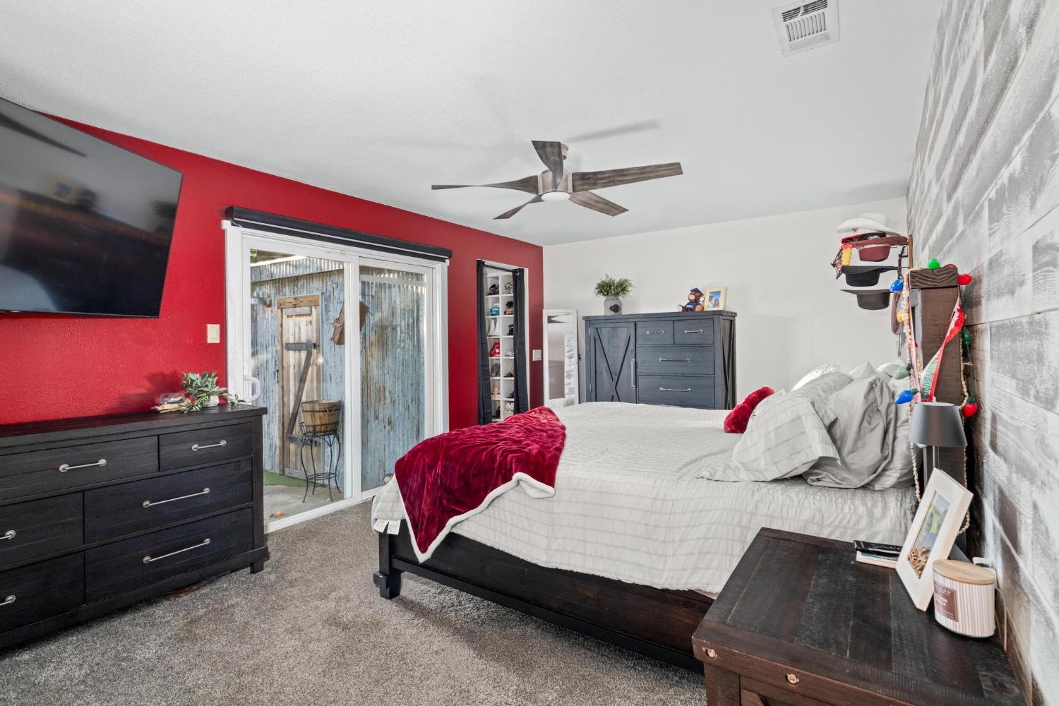 13791 Castle Road Manteca, CA 95336 - Photo 30 of 96 carpeted Primary bedroom with a ceiling fan and outside access