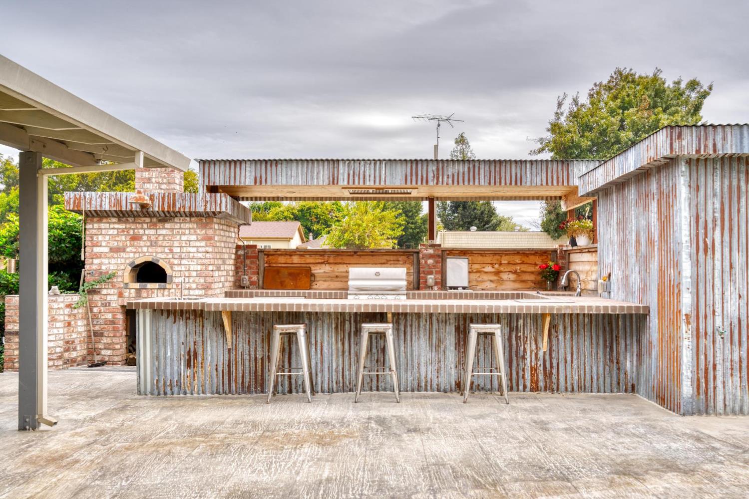 13791 Castle Road Manteca, CA 95336 - Photo 45 of 96 view of patio with grilling area and an outdoor bar