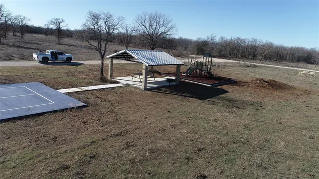 a view of a backyard of a house