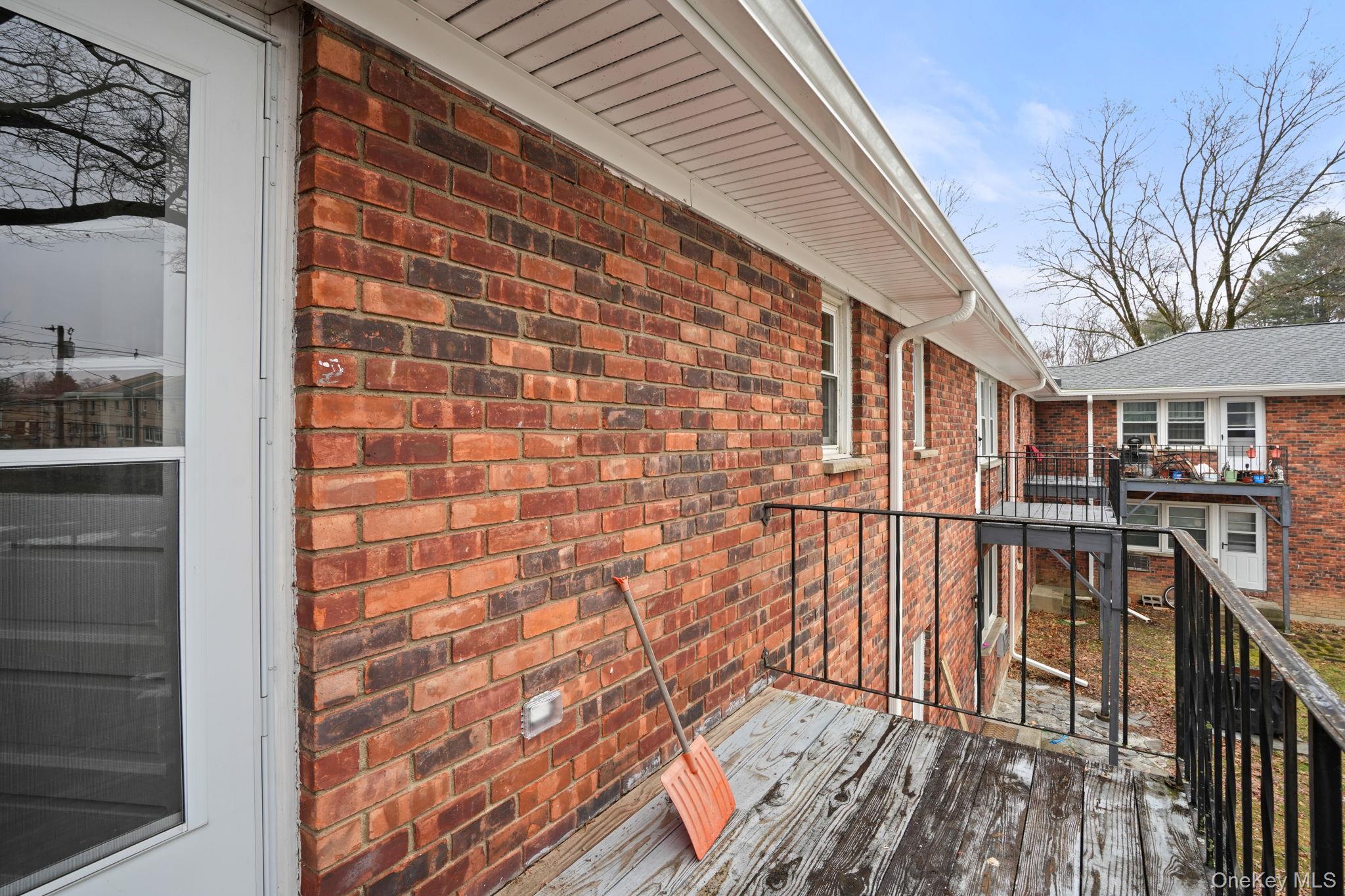 2710 South Road, Unit C6 Poughkeepsie, NY 12601 - Photo 18 of 19 a view of outdoor space with deck and wooden floor