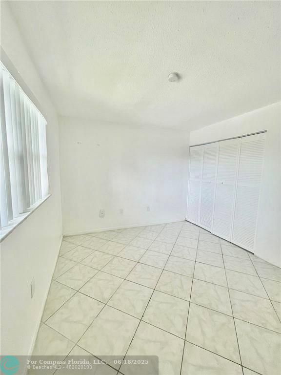 650 Southwest 2nd Avenue, Unit 256 Boca Raton, FL 33432 - Photo 11 of 13 a view of an empty room