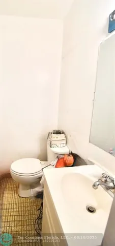a bathroom with a sink and a toilet