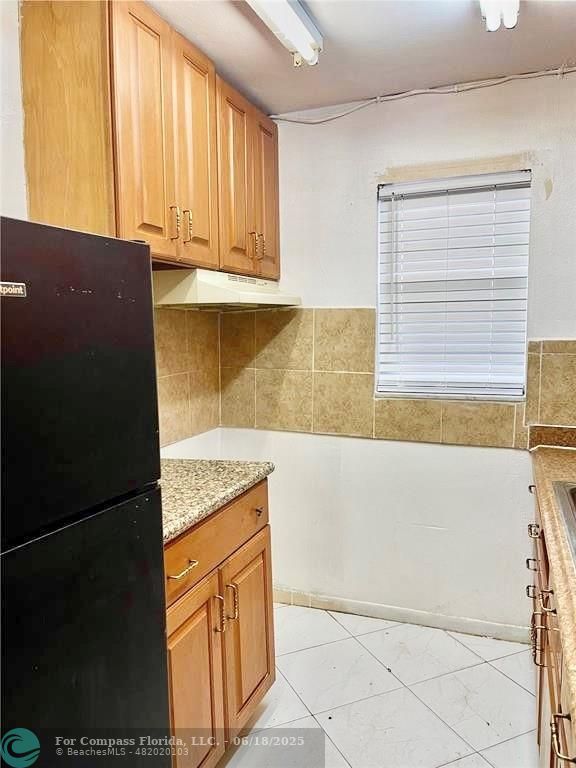 650 Southwest 2nd Avenue, Unit 256 Boca Raton, FL 33432 - Photo 4 of 13 a view of a kitchen