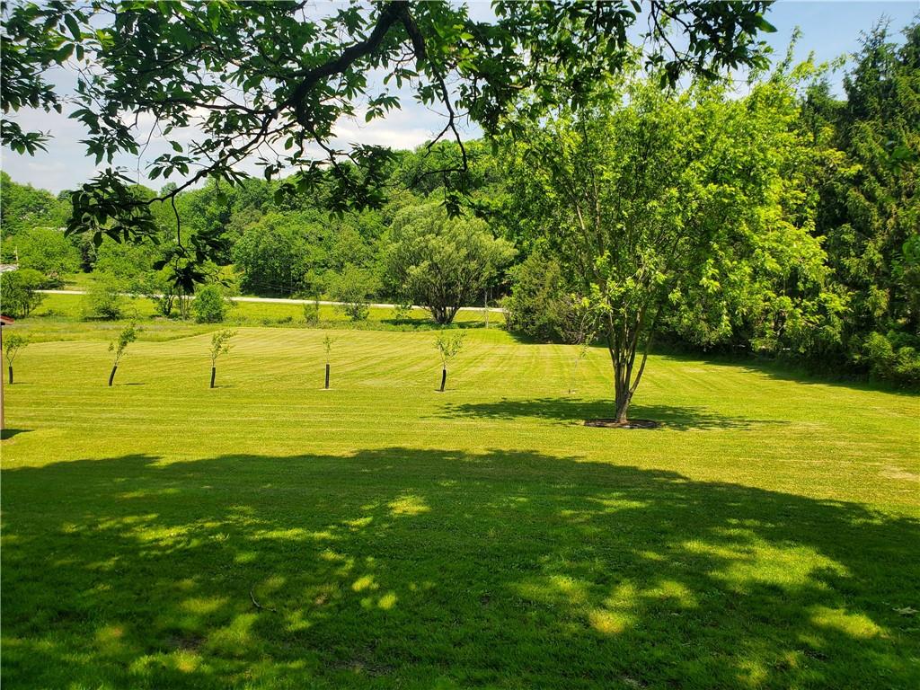 132 Hi Acres Road Greensburg, PA 15601 - Photo 34 of 45 a view of a golf course with a lake