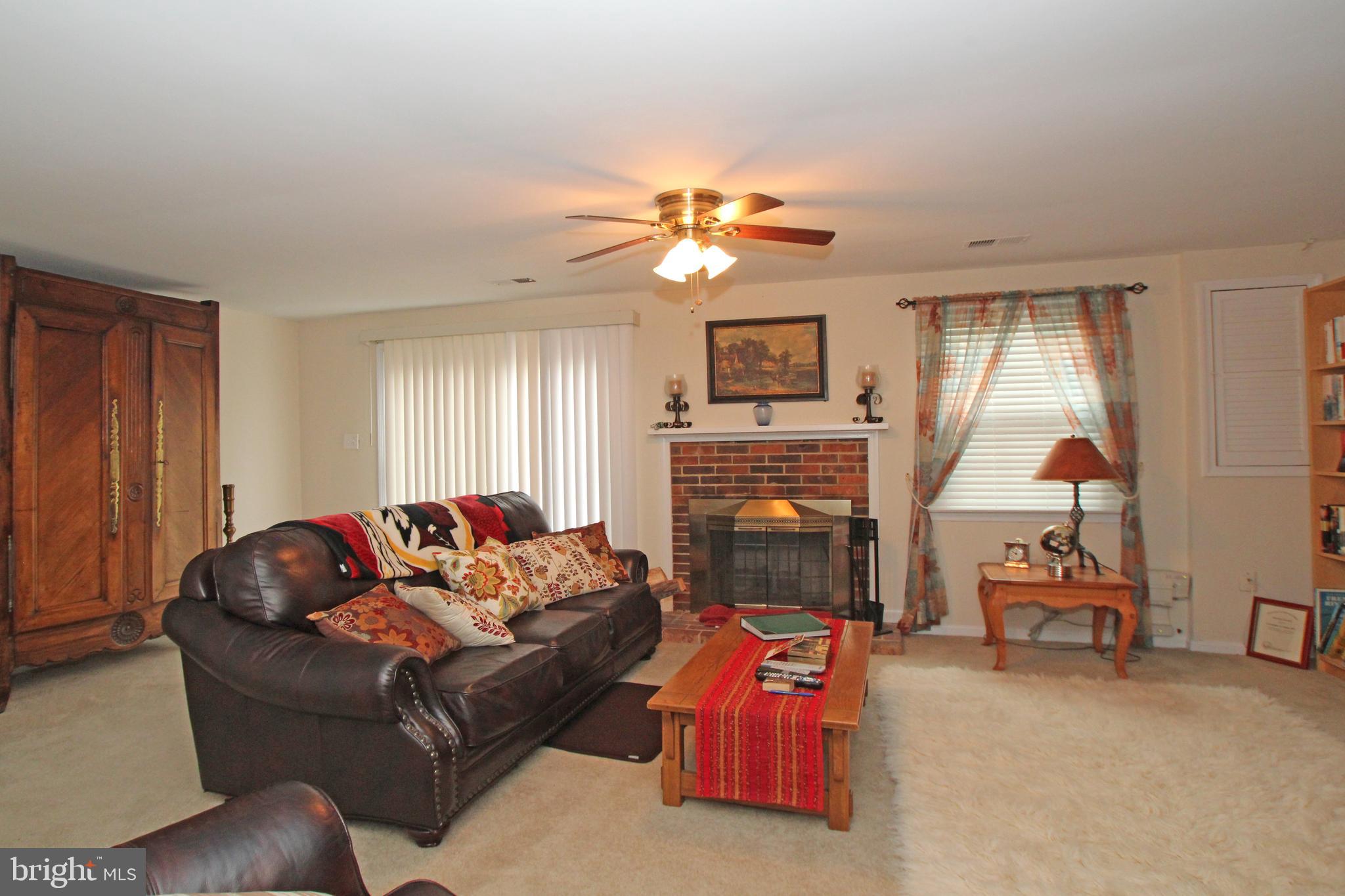 8132 Sleepy View Lane Springfield, VA 22153 - Photo 29 of 35 Huge walk-out basement with fireplace