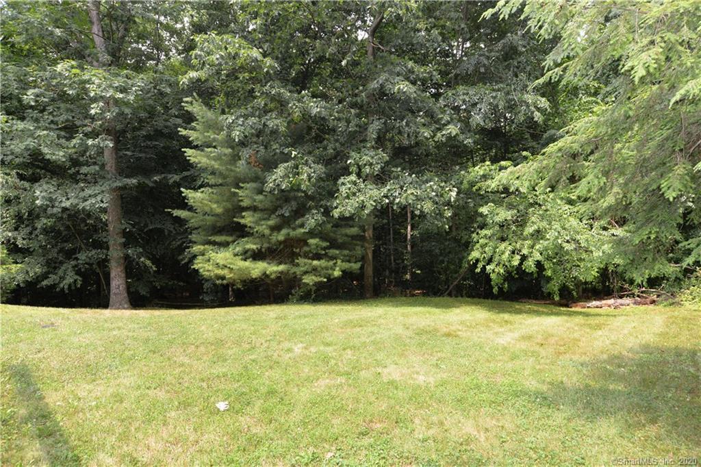 31 Powder Horn Hill Road Wilton, CT 06897 - Photo 14 of 16 a view of an outdoor space and a yard
