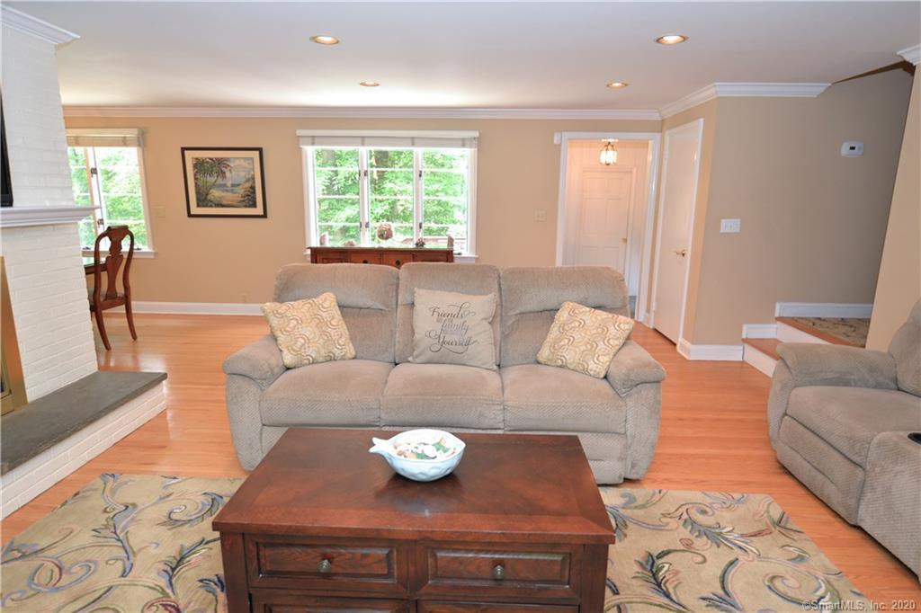31 Powder Horn Hill Road Wilton, CT 06897 - Photo 4 of 16 a living room with furniture and a large window