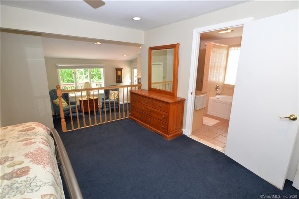 31 Powder Horn Hill Road Wilton, CT 06897 - Photo 6 of 16 a view of a livingroom with furniture and windows