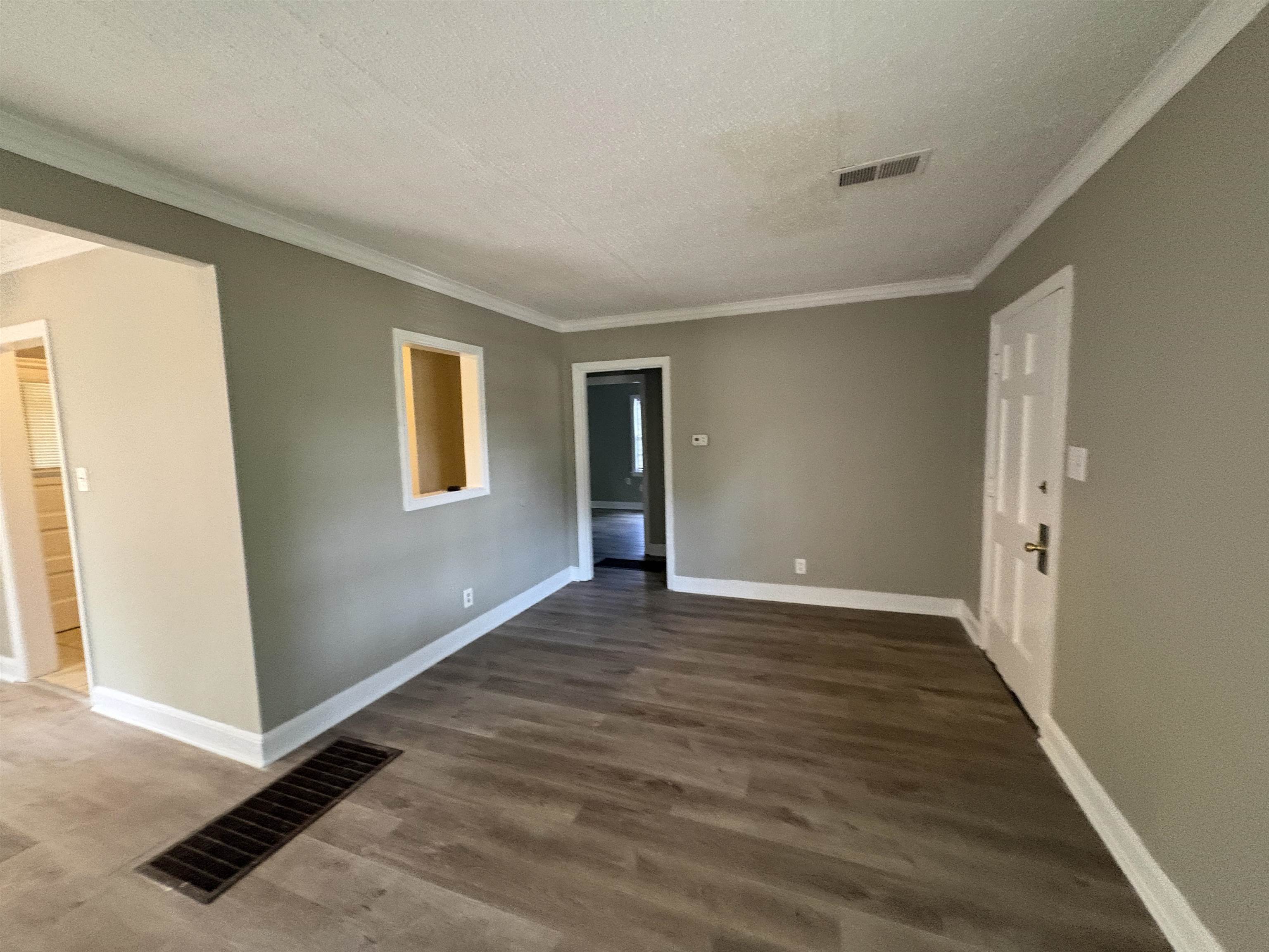 3391 Hadley Road Memphis, TN 38111 - Photo 5 of 11 Spacious interior with wood-finish flooring and neutral wall tones