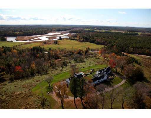 301 Cider Hill Road York, ME 03909 - Photo 4 of 23 Exterior Back. The land across from...