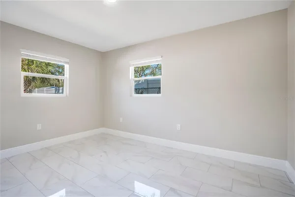 an empty room with windows