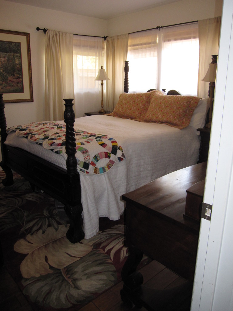 947 Cheltenham Road Santa Barbara, CA 93105 - Photo 13 of 35 a bedroom with a bed and a mirror