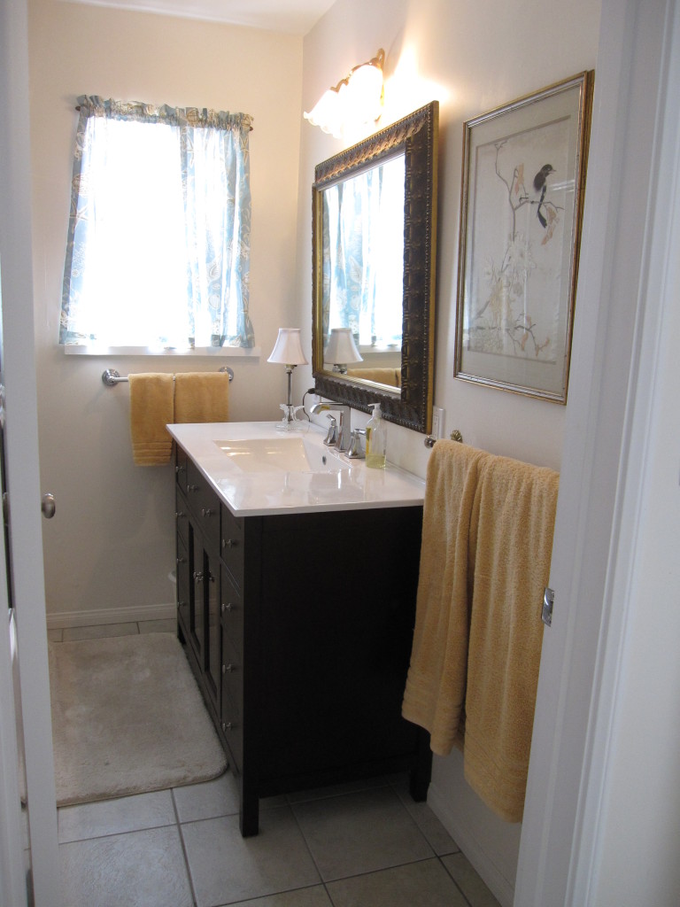 947 Cheltenham Road Santa Barbara, CA 93105 - Photo 14 of 35 a bathroom with a sink and a mirror