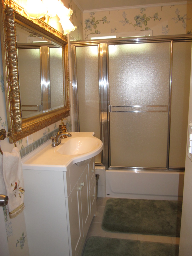 947 Cheltenham Road Santa Barbara, CA 93105 - Photo 15 of 35 a bathroom with a sink and a mirror