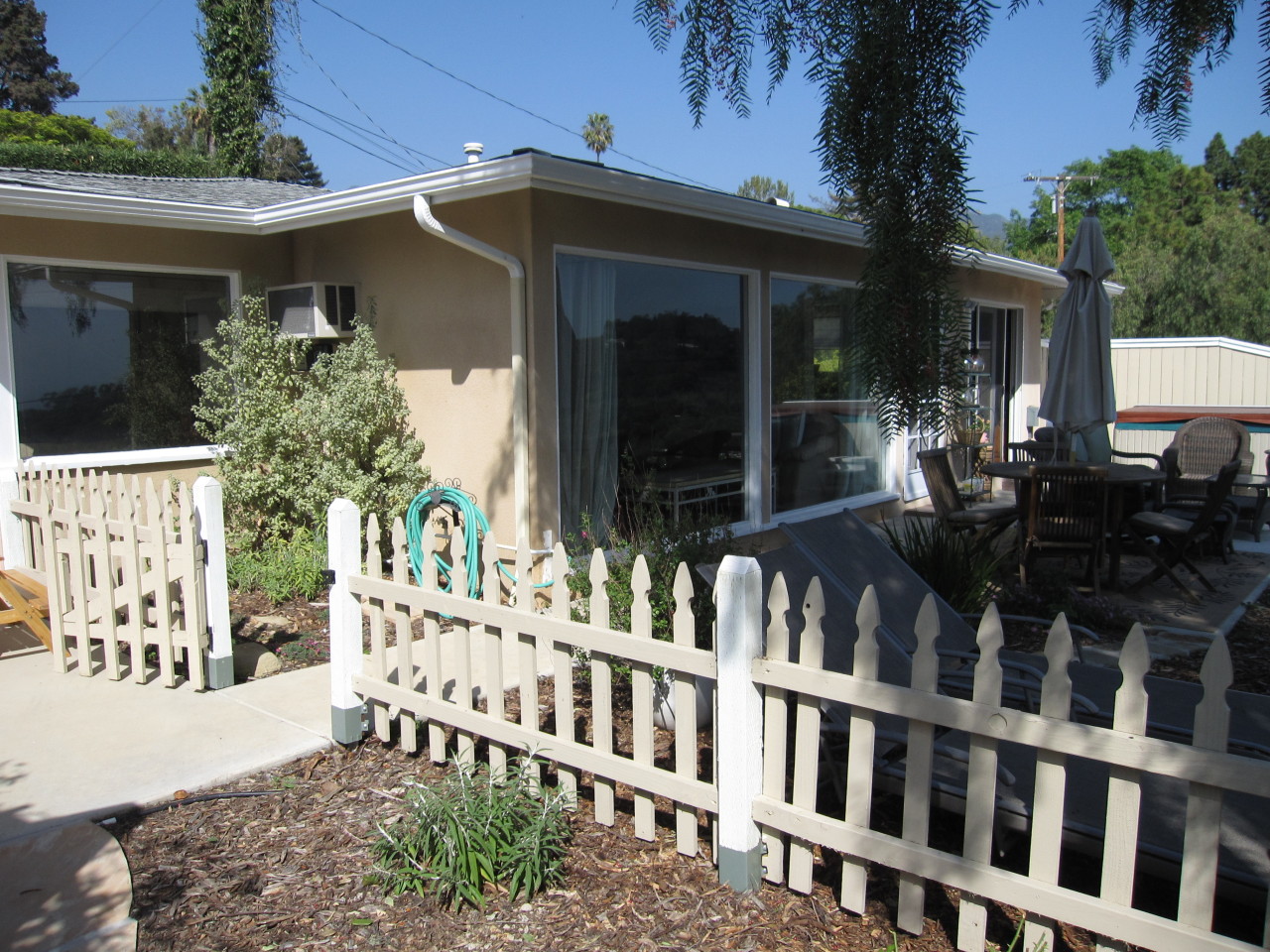 947 Cheltenham Road Santa Barbara, CA 93105 - Photo 20 of 35 a view of a house with backyard and sitting area