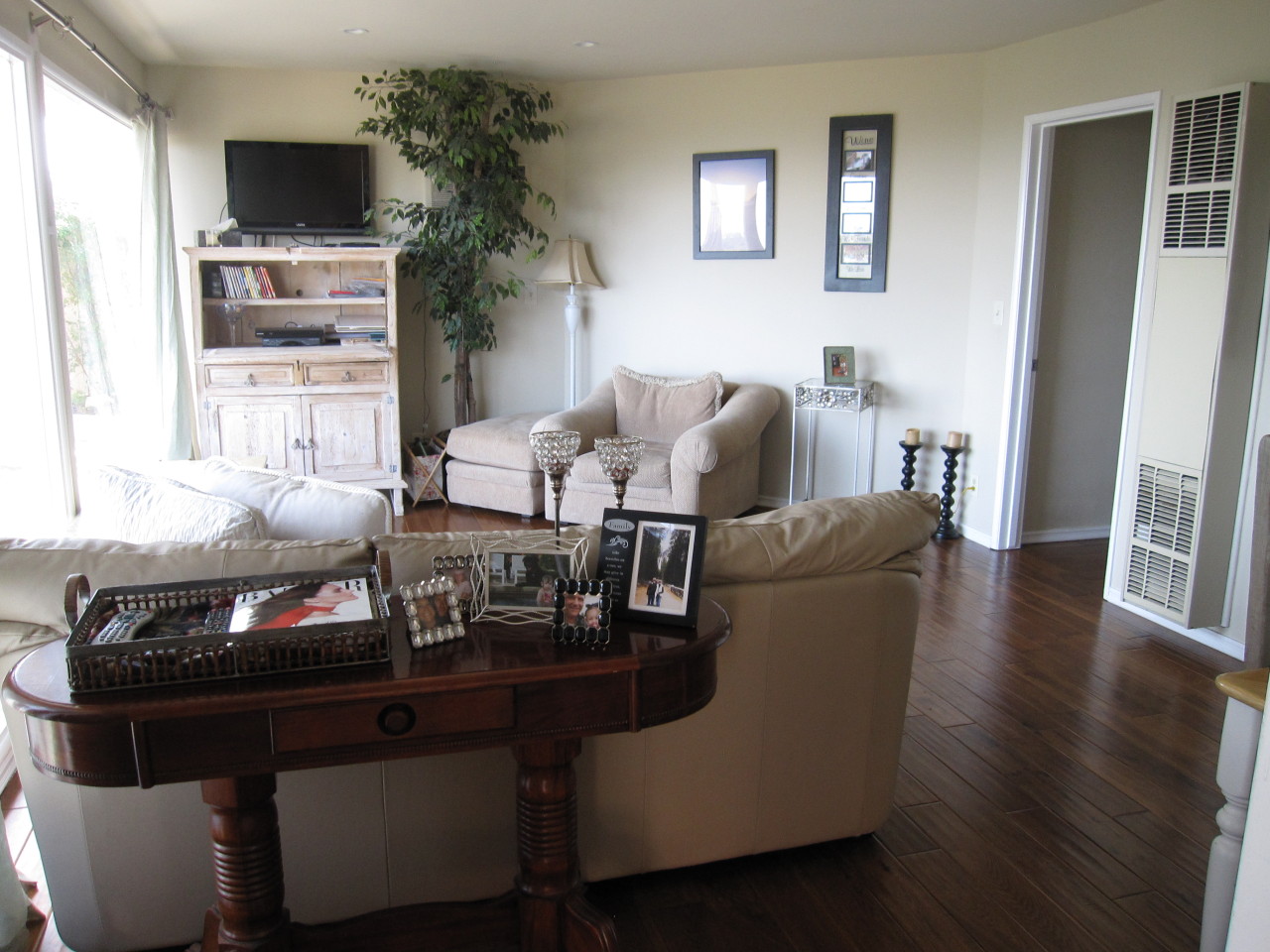 947 Cheltenham Road Santa Barbara, CA 93105 - Photo 25 of 35 a living room with furniture and a flat screen tv