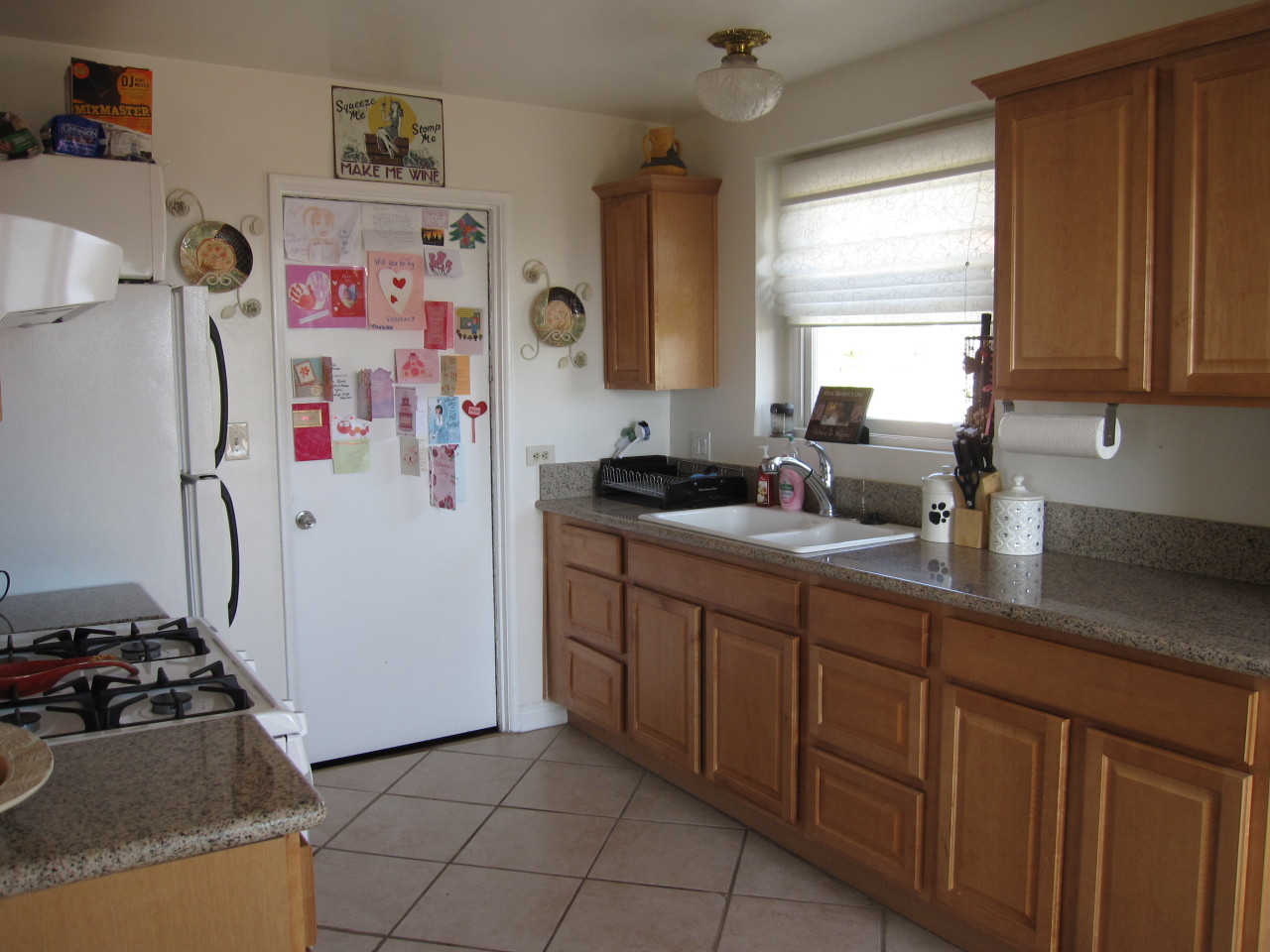 947 Cheltenham Road Santa Barbara, CA 93105 - Photo 27 of 35 a kitchen with stainless steel appliances granite countertop a refrigerator and a sink