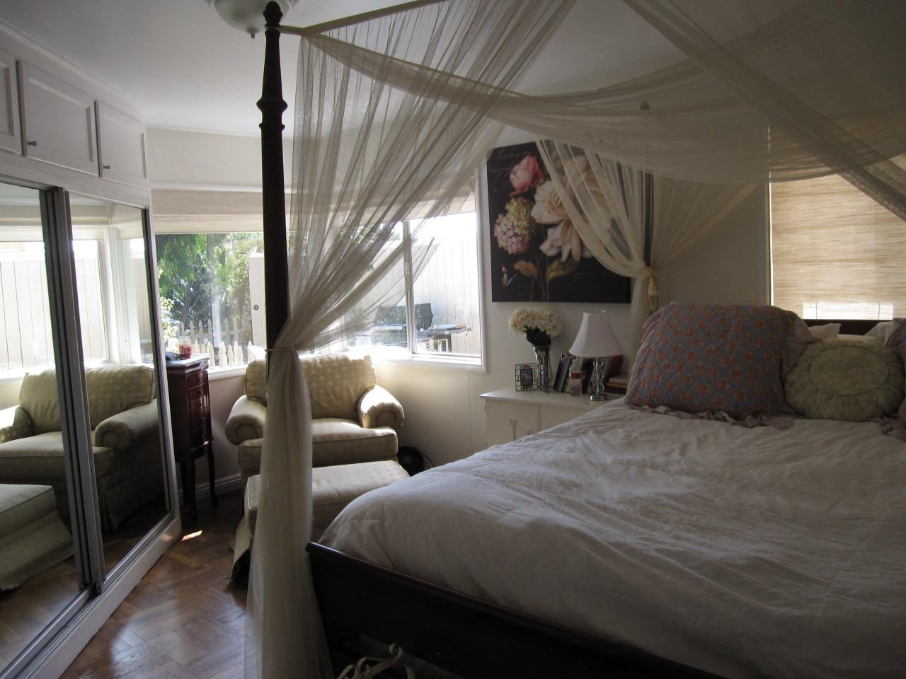 947 Cheltenham Road Santa Barbara, CA 93105 - Photo 28 of 35 a bedroom with a large bed and a window