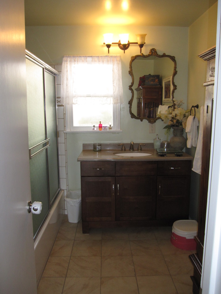 947 Cheltenham Road Santa Barbara, CA 93105 - Photo 30 of 35 a bathroom with a sink and a mirror