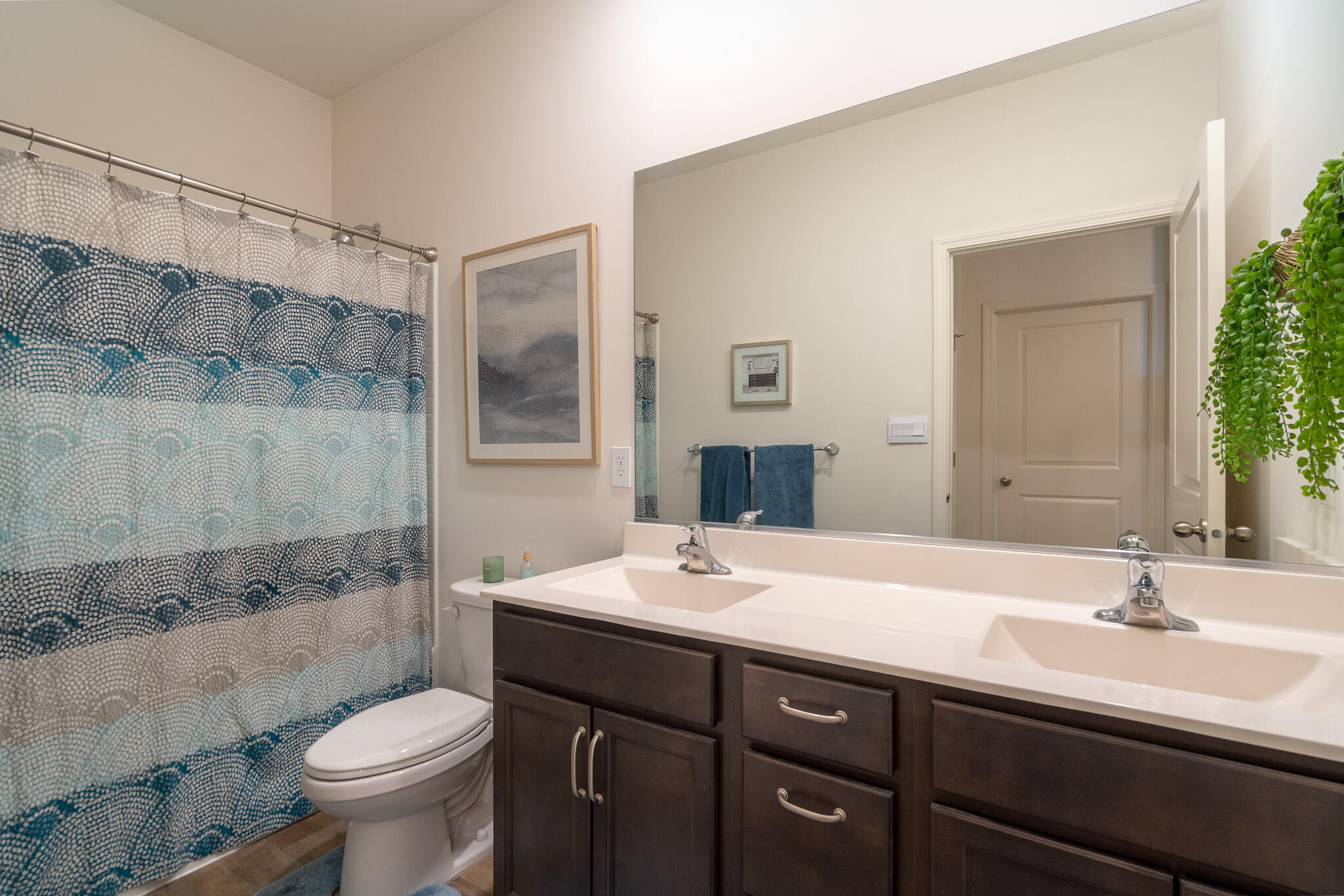 7700 West 105th Avenue Crown Point, IN 46307 - Photo 20 of 39 a bathroom with a sink and a mirror