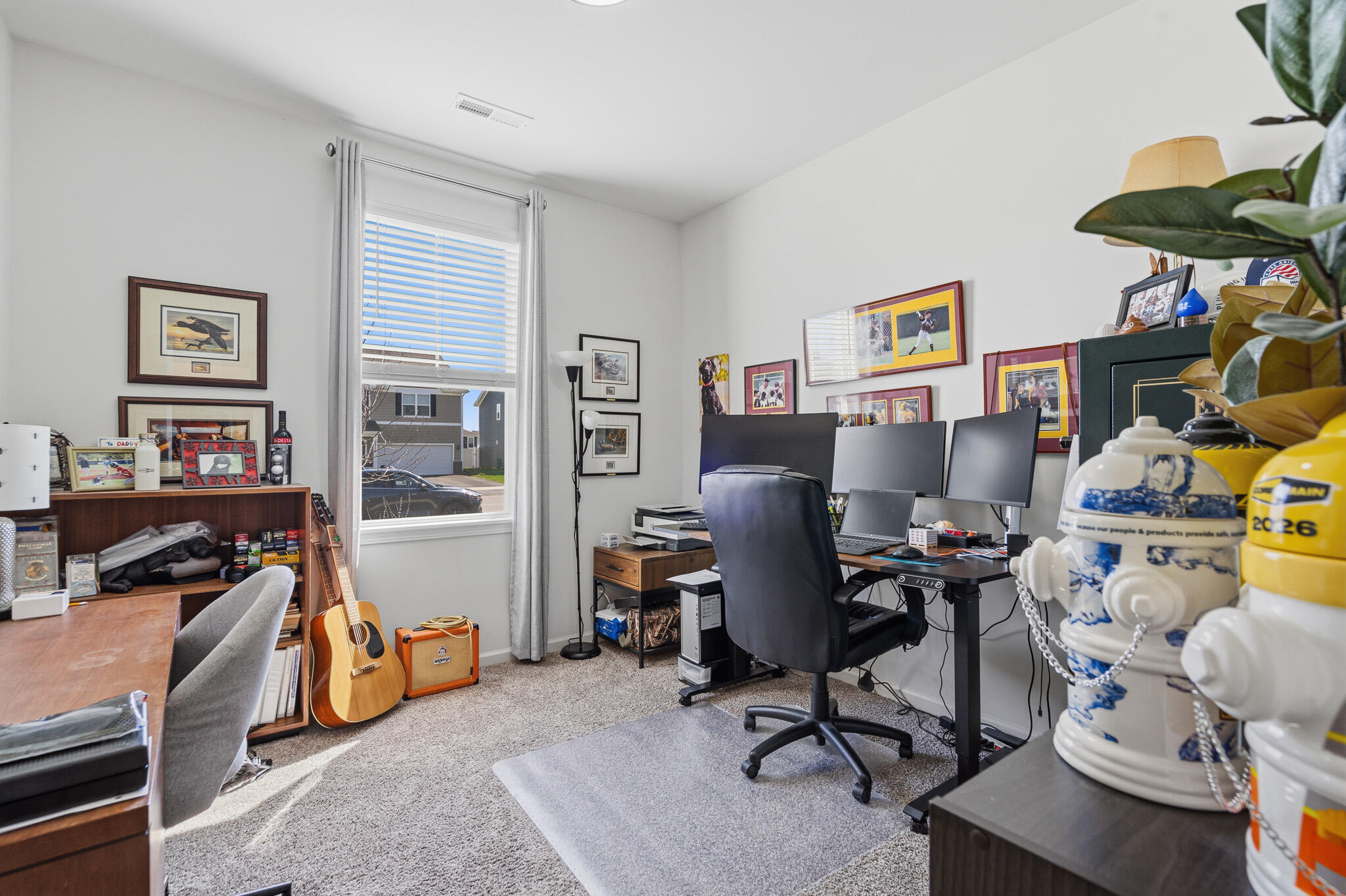 7700 West 105th Avenue Crown Point, IN 46307 - Photo 21 of 39 a view of a workspace with a window and workspace