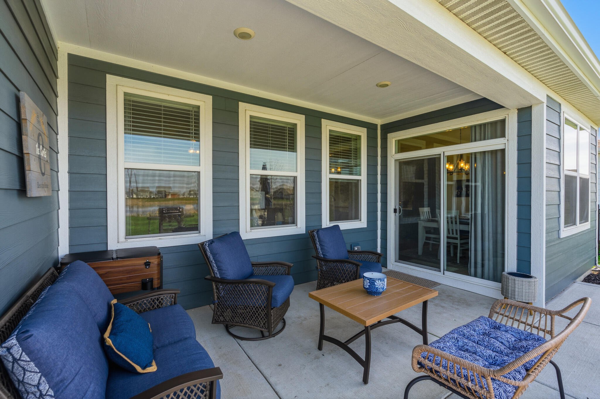 7700 West 105th Avenue Crown Point, IN 46307 - Photo 32 of 39 a outdoor living space with furniture and a window