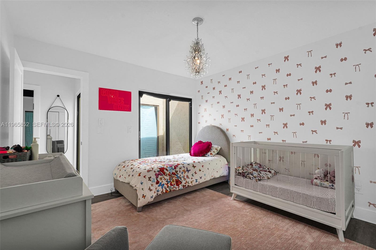 7635 Sierra Terrace West Boca Raton, FL 33433 - Photo 30 of 53 a bedroom with a bed and a couch