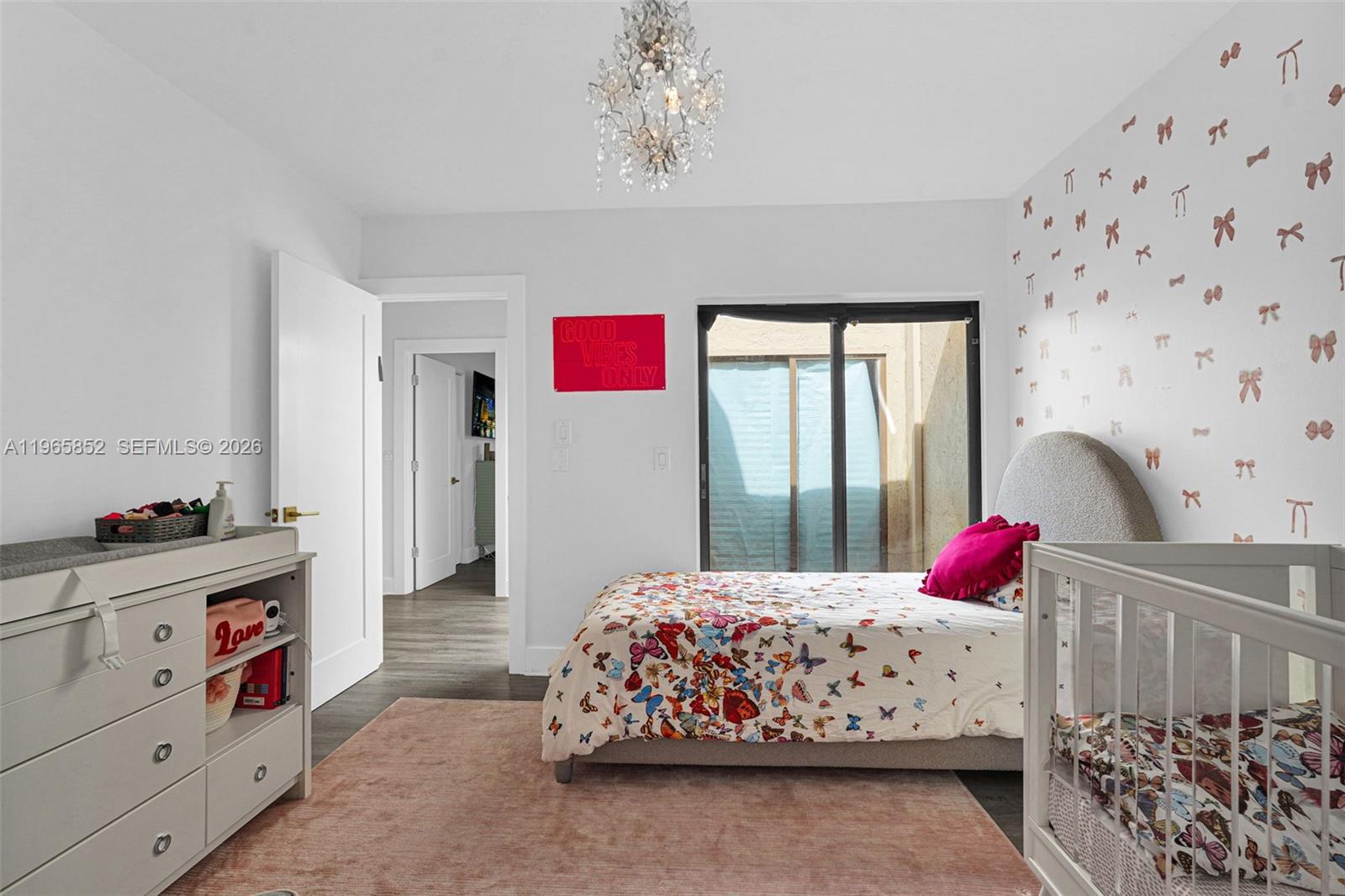 7635 Sierra Terrace West Boca Raton, FL 33433 - Photo 31 of 53 a bedroom with a bed and a dresser