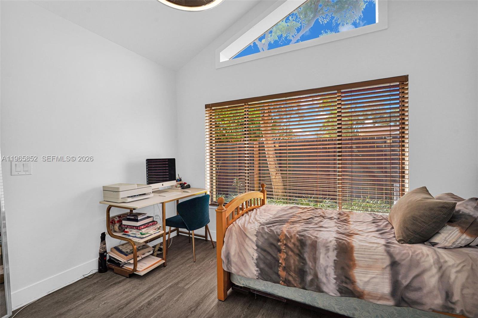 7635 Sierra Terrace West Boca Raton, FL 33433 - Photo 33 of 53 a bedroom with a bed and a desk