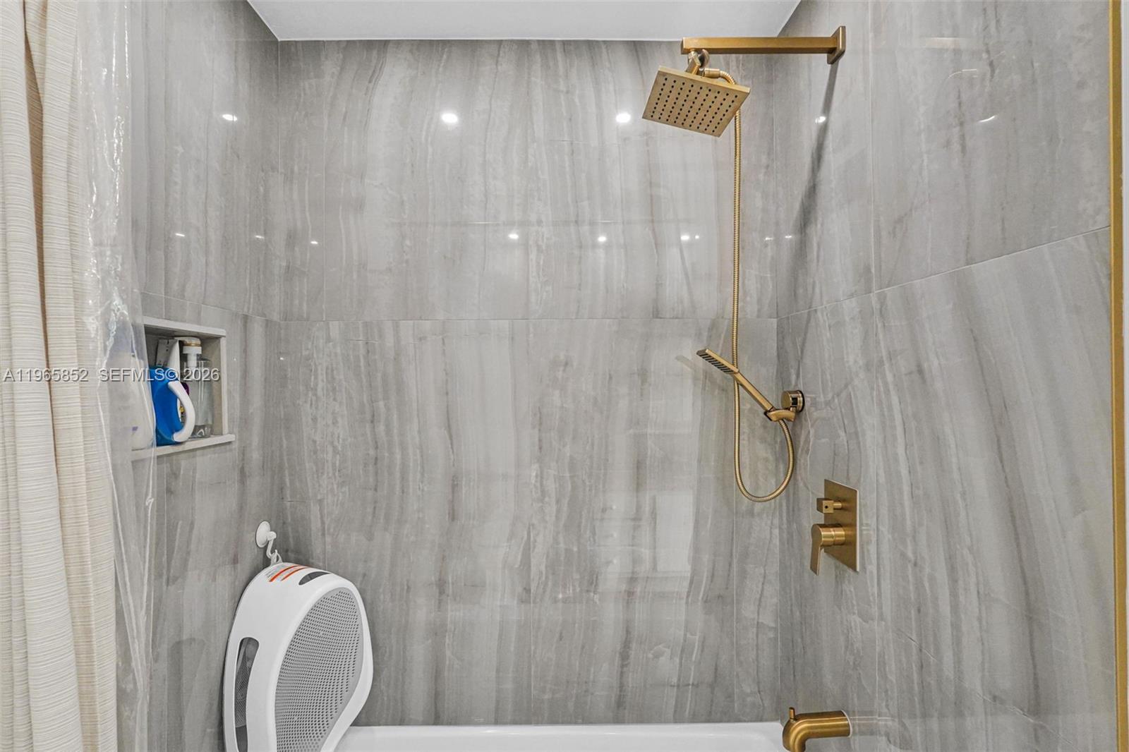 7635 Sierra Terrace West Boca Raton, FL 33433 - Photo 36 of 53 a bathroom with a shower and a sink