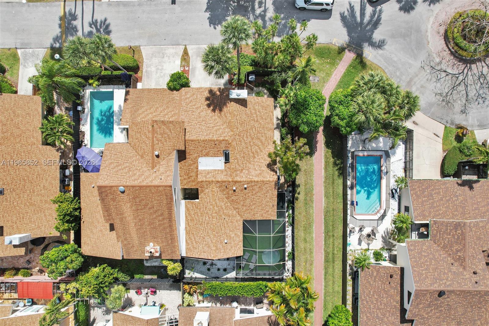 7635 Sierra Terrace West Boca Raton, FL 33433 - Photo 39 of 53 an aerial view of residential houses with outdoor space and parking