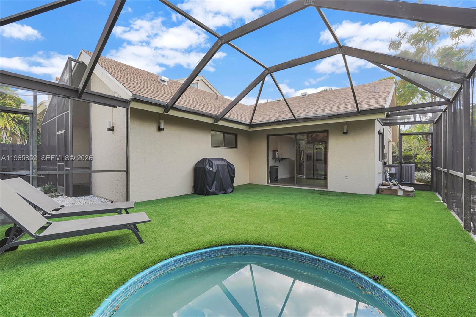 7635 Sierra Terrace West Boca Raton, FL 33433 - Photo 41 of 53 a view of a porch with a backyard