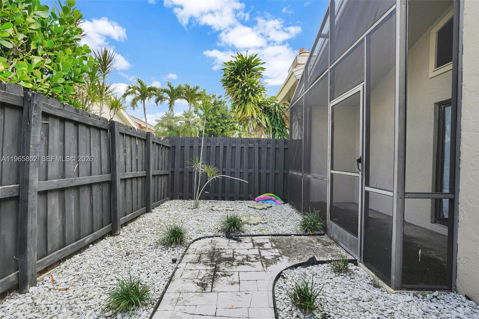 7635 Sierra Terrace West Boca Raton, FL 33433 - Photo 47 of 53 a view of a backyard