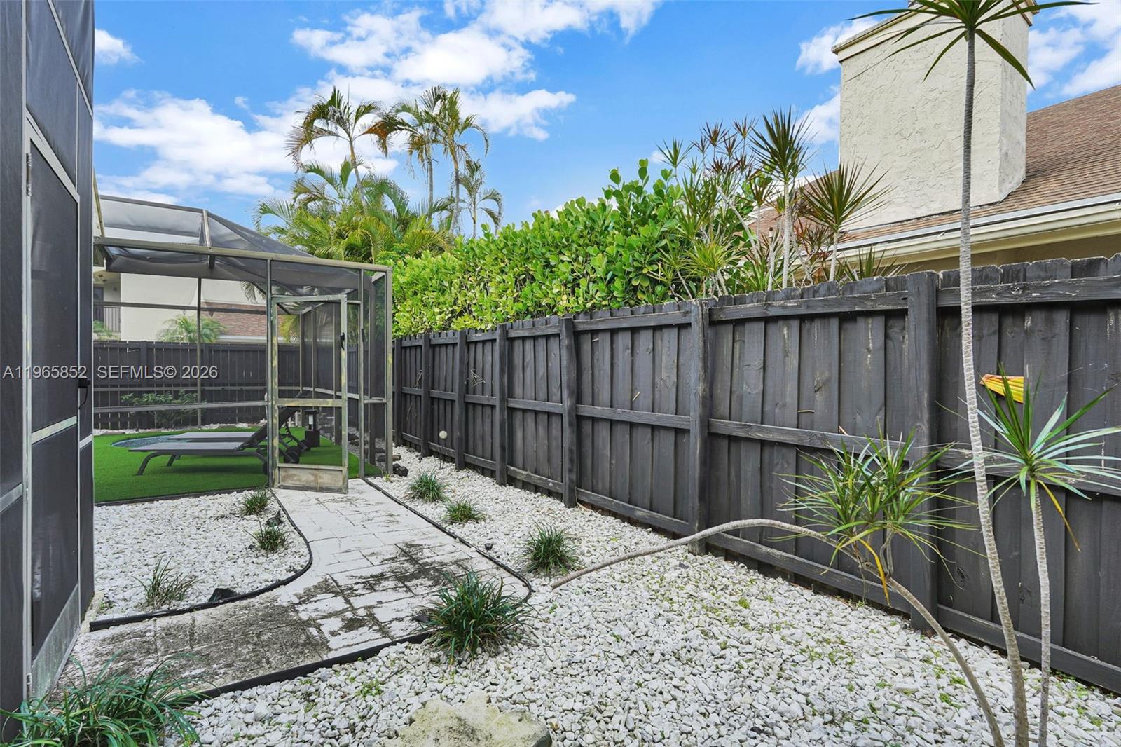 7635 Sierra Terrace West Boca Raton, FL 33433 - Photo 50 of 53 a view of garden with patio