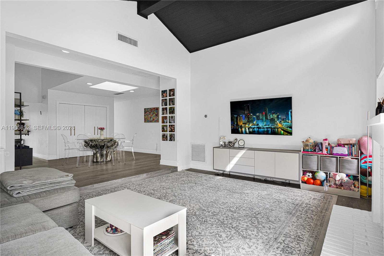 7635 Sierra Terrace West Boca Raton, FL 33433 - Photo 9 of 53 a living room with furniture and a flat screen tv