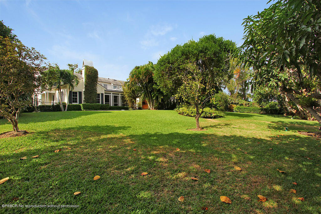 303 Arabian Road Palm Beach, FL 33480 - Photo 14 of 16 East Side Yard 1