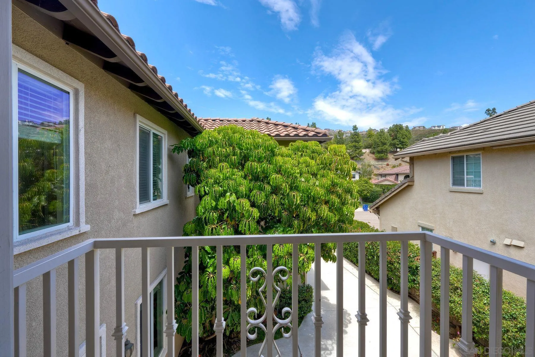 1614 Reflection Street San Marcos, CA 92078 - Photo 32 of 40 a view of a balcony with an outdoor space