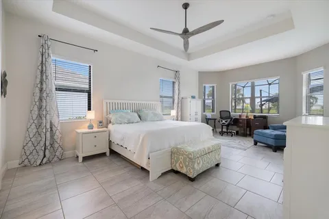 a bedroom with a bed and a window in it