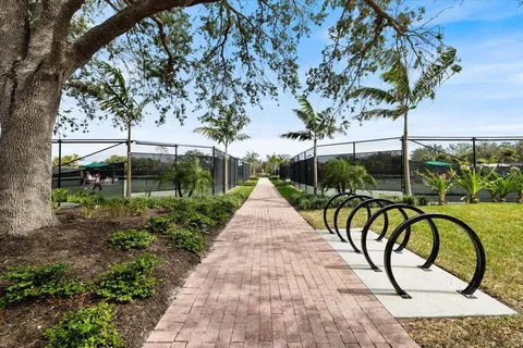 a living room with furniture or kitchen view and a wooden floor